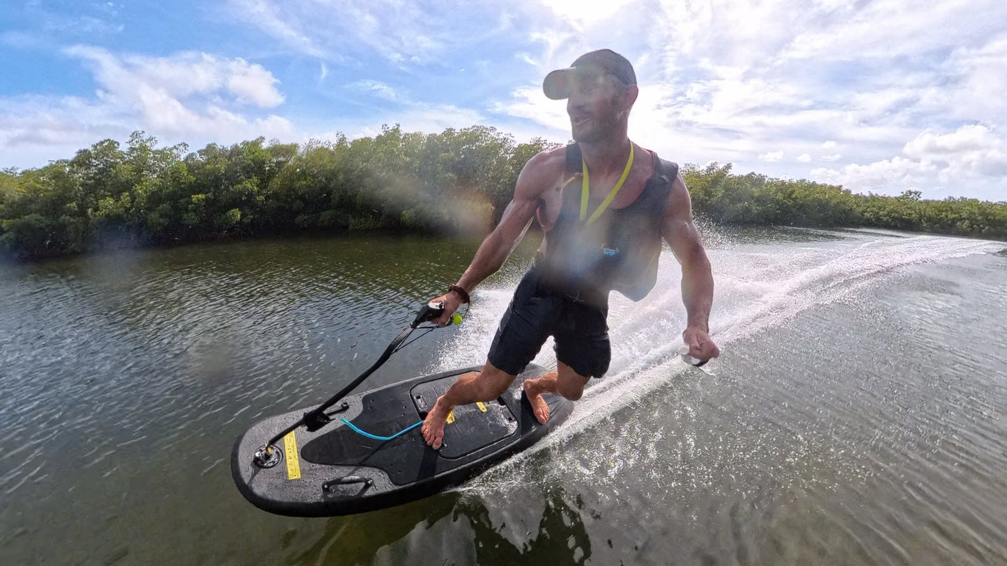 Moovi electric surfboard being ridden on Biscayne Bay