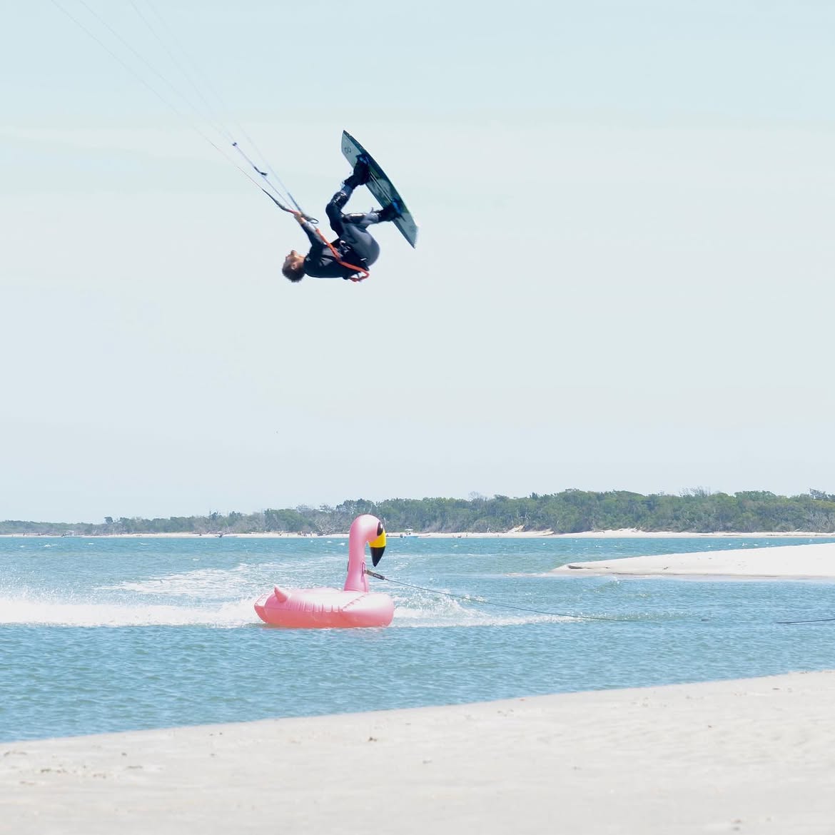 Learning to kitesurf in waist-deep water in Biscayne Bay